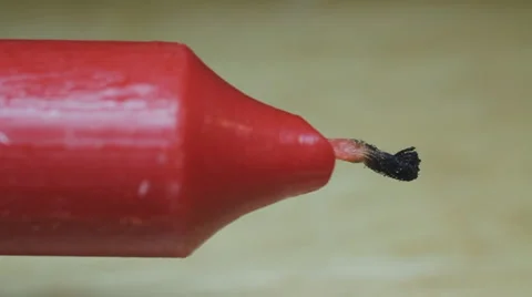 Macro of Red Candle Being Lit by Match and Catching Fire Video stock 1215442