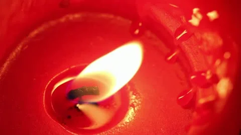 A Macro of a Red Colored Candle Flame Stock Footage 10946114