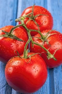 Macro of red ripe tomatoes. Stock Photos