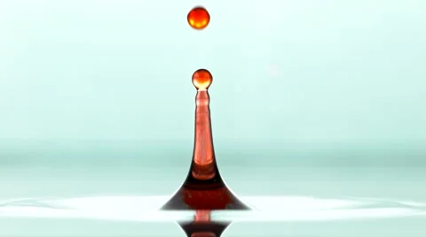 Macro Of Red Water Droplet Falling In Torquoise Water In Super Slow Motion 스톡 동영상 63143789