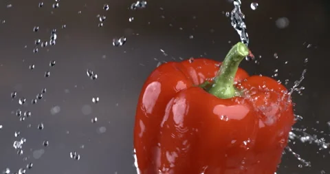 Macro of ripe red fresh red pepper in the kitchen while cooking with pure water Stock Footage 269352057