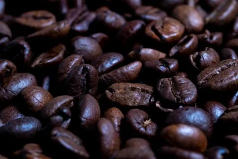 Macro roasted coffee beans close-up, top view. Full frame, blurred foreground 写真素材
