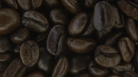 Macro Rotating Coffee Beans With Soft Smoke. Stock Footage 334575414