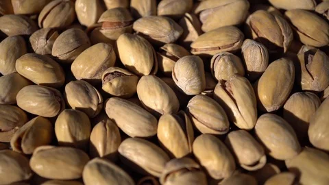 Macro of Rotating Pistachios Stock Footage 93837314