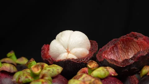 Macro Rotating Video Of Fresh Cut Mangosteen White Flesh Stock Footage 336227786