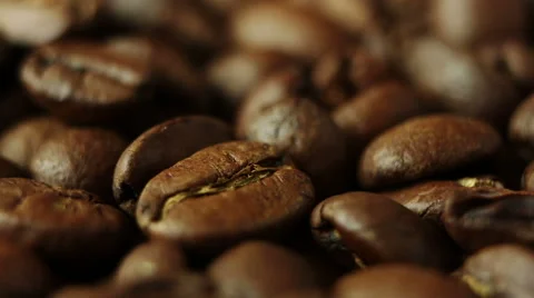 Macro rotation of aromatic roasted coffee beans Stock Footage 62092036