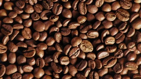 Macro, Rotation Around The Circle Of Coffee Beans Lie On The Table Stock Footage 99122370