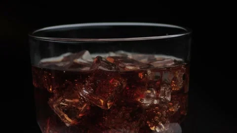 Macro rotation shot of cola drink. 動画素材 141809804