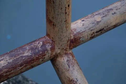 Macro of rusty iron pipe joint at twilight Stock-Fotos