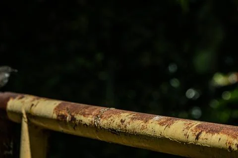Macro of rusty iron railing texture at night Stock Photos
