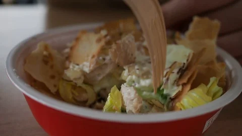 Macro of salad plate. Eating with fork in a cafe. Close-up. Stock Footage 128539791