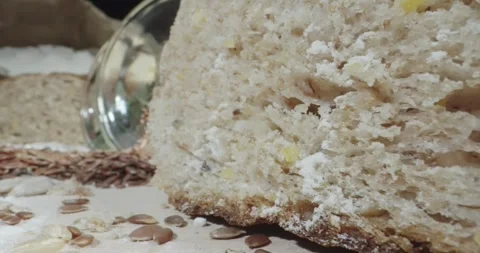 Macro scene dolly shot of bread slice with healthy cereals, probe lens cinema Stock Footage 330122647