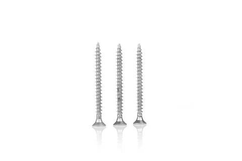Macro screw of silver color on a white background Stock Photos
