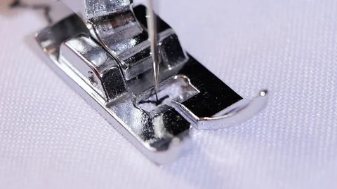 Macro. Sewing needle does figured seam. Slow motion Stock Footage 69958500