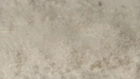 MACRO: Shaking of white wheat powder - Slow motion Stock Footage 91041437