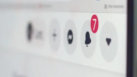 Macro shallow view of device screen with notifications in facebook application Stock Footage 145785869