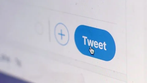 Macro shallow view of device screen with tweet button in mobile application Stock Footage 145825794