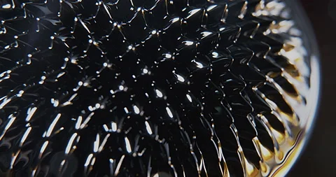 Macro shoot of an abstract ferro magnetic fluid surface Stock Footage 152417180
