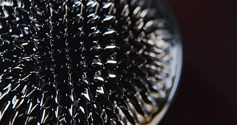 Macro shoot of a black abstract ferro fluid with moving lights Stock Footage 152417478