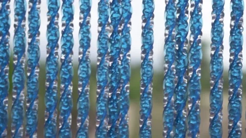 Macro shoot of a blue colored fly mosquito door curtain detail. Stock Footage 231553263