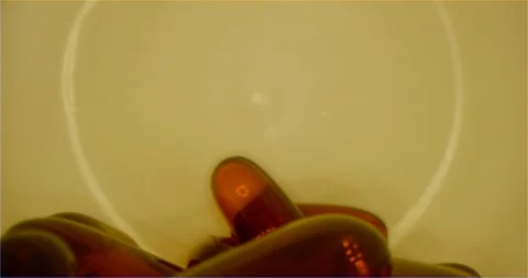 Macro shoot of can with red pills Video stock 126287283