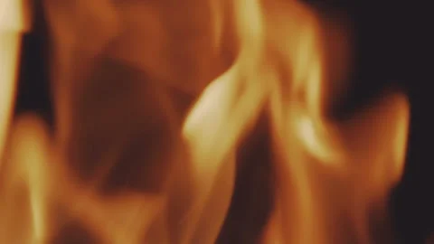 Macro shoot of a flaming fire on black background. Slowly Video stock 89716168