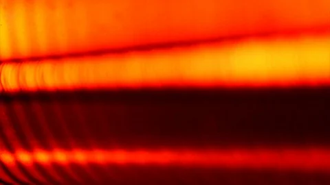 Macro shoot of a hot red electric heater Stock Footage