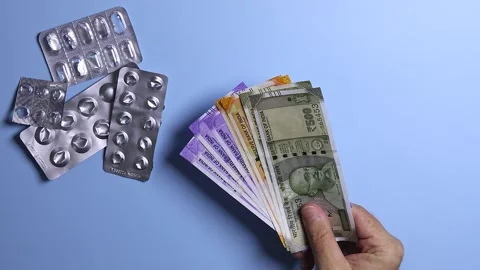 Macro shoot of man's hands counting indian rupees (INR) banknotes. Stock Footage 303240230