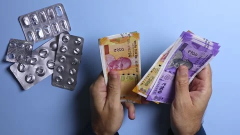 Macro shoot of man's hands counting indian rupees (INR) banknotes. Stock Footage 303240417
