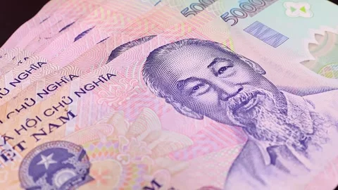 Macro shoot of rotating five hundred vietnamese dong bills. Stock Footage 294596384