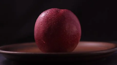 Macro shooting of apples with water drops Stock Footage 186988368