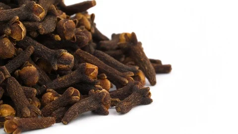 Macro shooting bottom part of dried cloves heap. Rotating on the turntable. Stock Footage 96481348