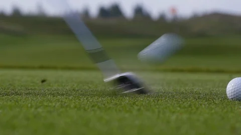 Macro shooting of  golf ball on green field in the valley. Stock Footage 124384886