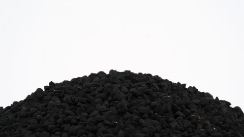 Macro shooting of upper part of black caraway pile. Rotating on the turntable. Stock Footage 96456196