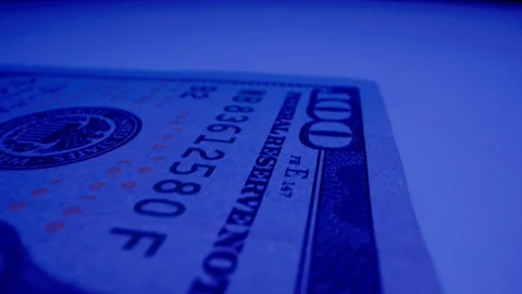 Macro Shot of $100 Bill Under UV Light 02 Stock-Footage 128202669