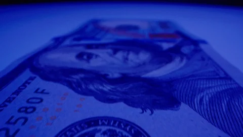 Macro Shot of $100 Bill Under UV Light 04 Stock-Footage 128202878