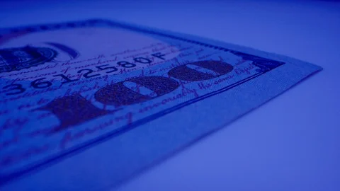 Macro Shot of $100 Bill Under UV Light 09 Stock-Footage 128204431