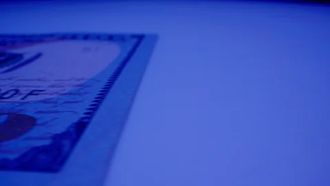 Macro Shot of $100 Bill Under UV Light 10 Stock-Footage 128204497