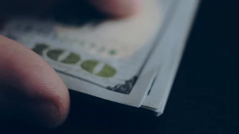 Macro shot of a 100 dollar. Hundred-dollar bills close-up Stock Footage 86323097