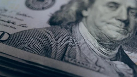 Macro shot of a 100 dollar. Hundred-dollar bills close-up Stock Footage 86323140