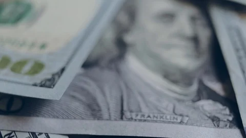 Macro shot of a 100 dollar. Hundred-dollar bills close-up Vídeo Stock 86323152