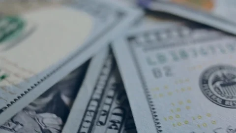 Macro shot of a 100 dollar. Hundred-dollar bills close-up Stock Footage 86323172