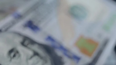 Macro shot of a 100 dollar. Hundred-dollar bills close-up Stock Footage 86323197