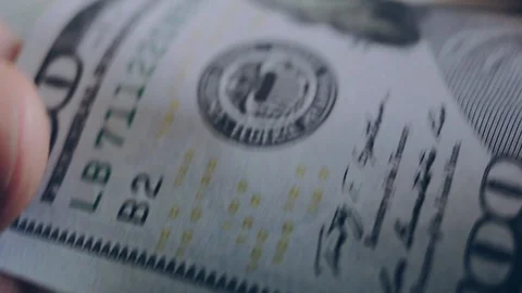 Macro shot of a 100 dollar. Hundred-dollar bills close-up Stock Footage 86323253