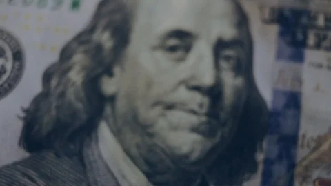 Macro shot of a 100 dollar. Hundred-dollar bills close-up Stock Footage 86323302