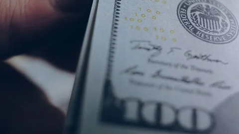 Macro shot of a 100 dollar. Hundred-dollar bills close-up Stock Footage 86323326