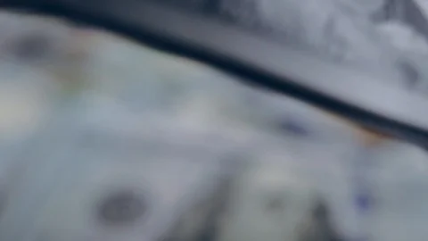 Macro shot of a 100 dollar. Hundred-dollar bills close-up Stock Footage 86323392