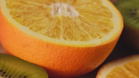 Macro shot above cut citrus fruit at an angle Stock Footage 332081322
