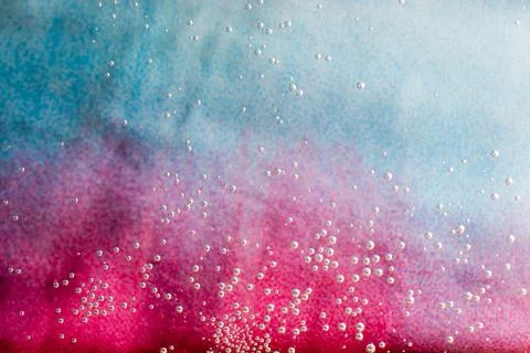 Macro shot of air bubbles over colored background Stock Photos