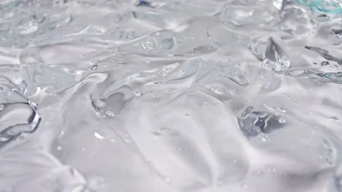 Macro Shot of air Bubbles in Transparent Cosmetic Liquid Gel Cream. Fluid Video stock 155072652